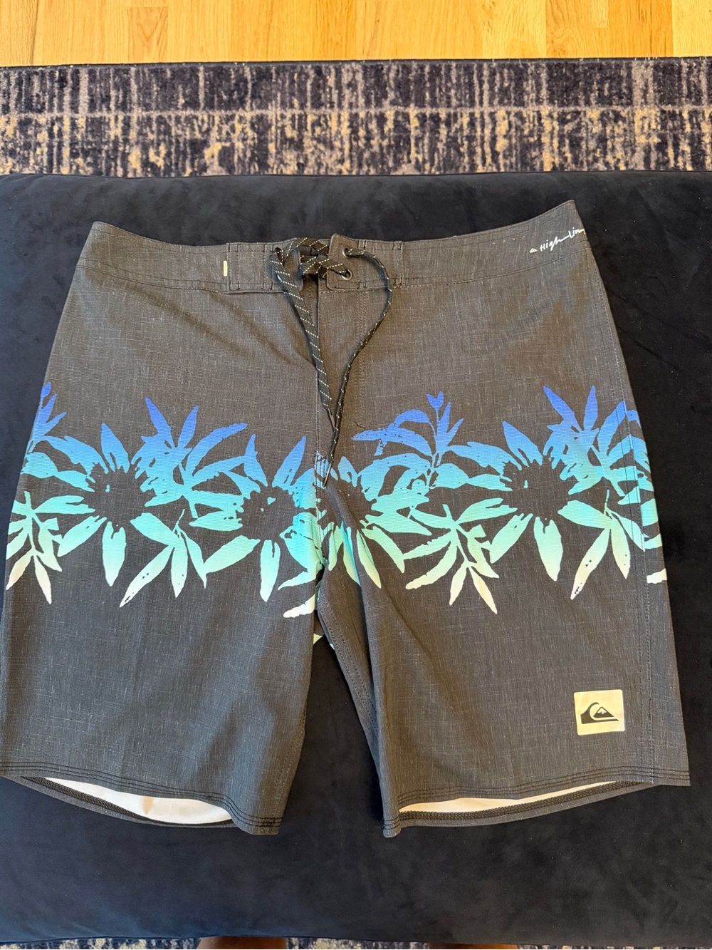 Quiksilver Men’s Black Boardshorts with Blue-Teal Floral Band